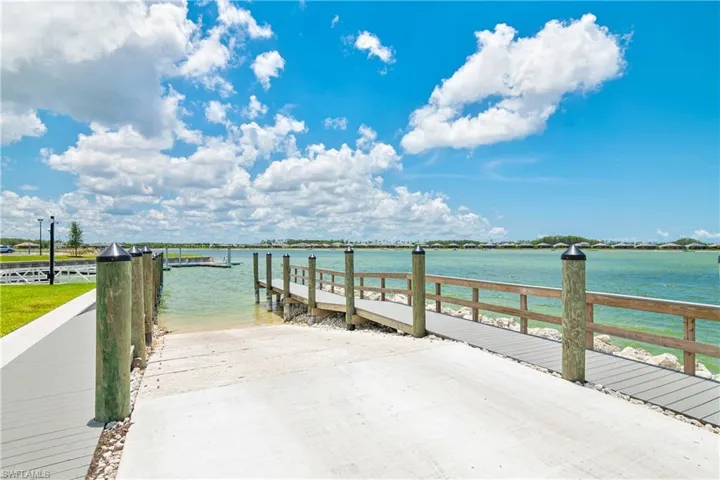 Dock with a boat ramp and a water view