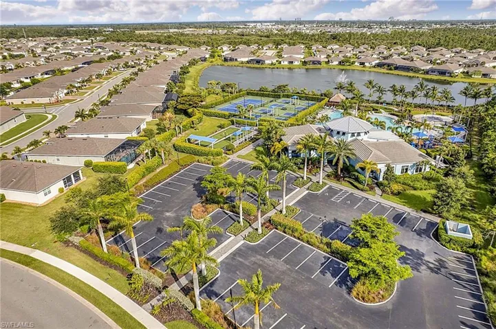 Aerial perspective showcasing a residential community with abundant green spaces