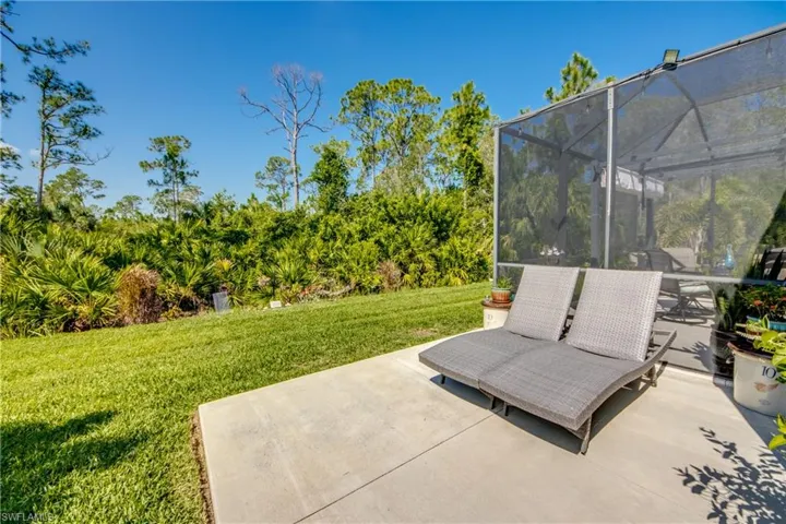 View of patio with glass enclosure