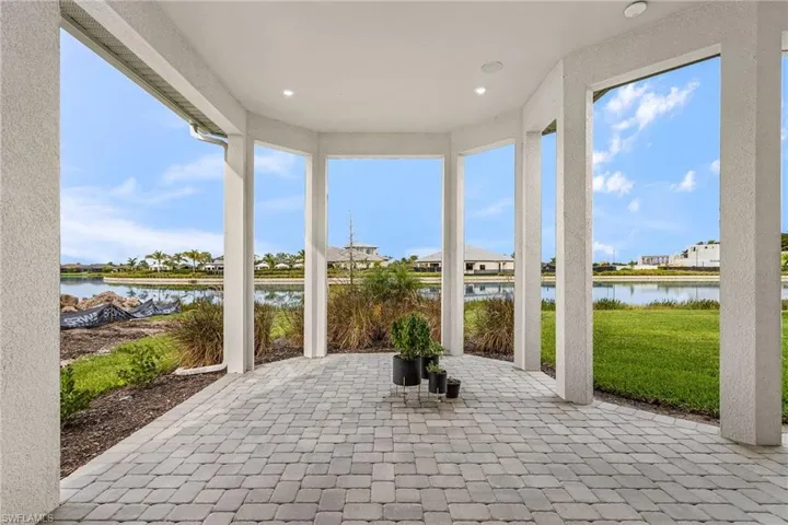 View of patio with a water view
