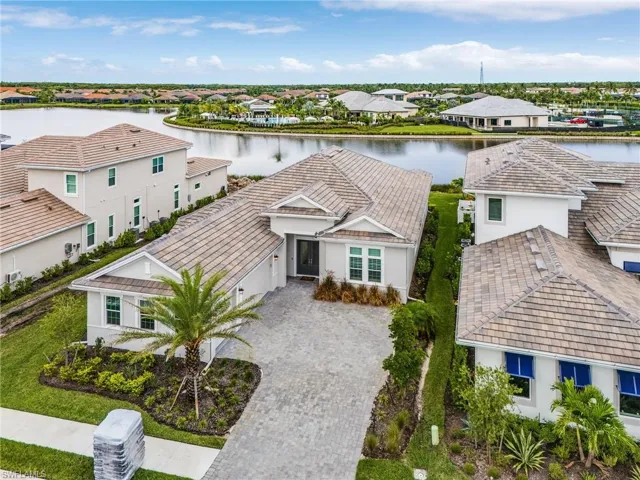 Aerial view of residential area with a large body of water