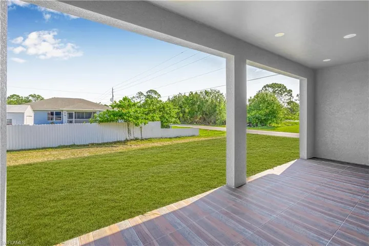 Wooden deck with a patio area