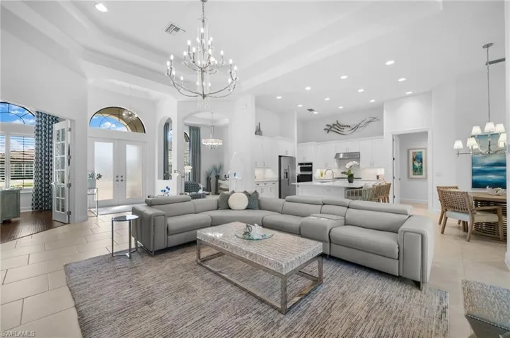 Lovely open Entry with tray ceiling and open to family and kitchen area!