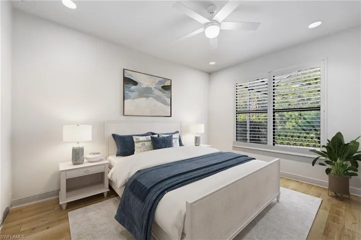 *This room is digitally staged*Guest bedroom #3 with lovely window, recessed lights and ceiling fan!