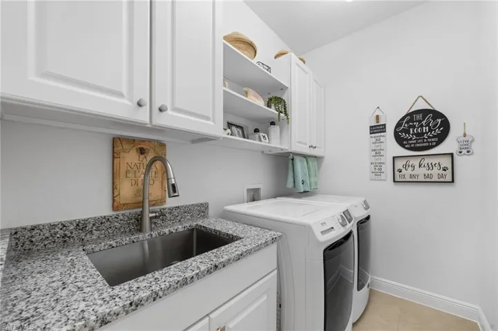 New washer and dryer! Lovely storage and sink!