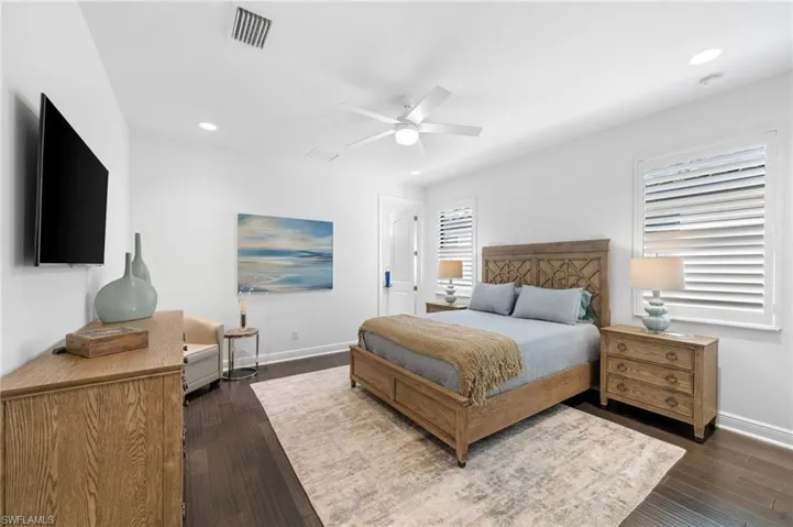 Guest bedroom #1. With lovely windows and ceiling fan! All new door hardware throughout home!