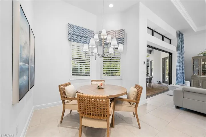Dining area just off the kitchen overlooking the pool!