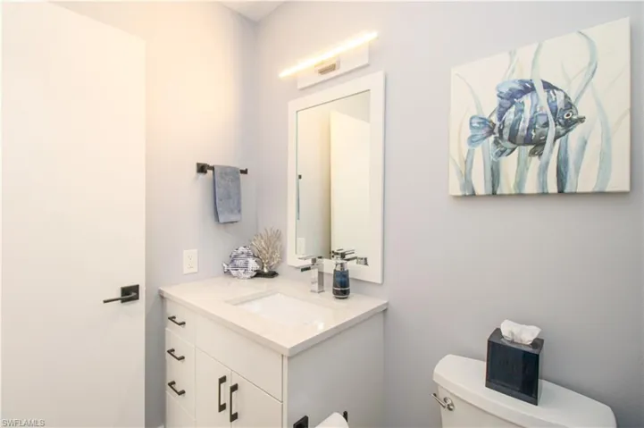 Bathroom with vanity and toilet