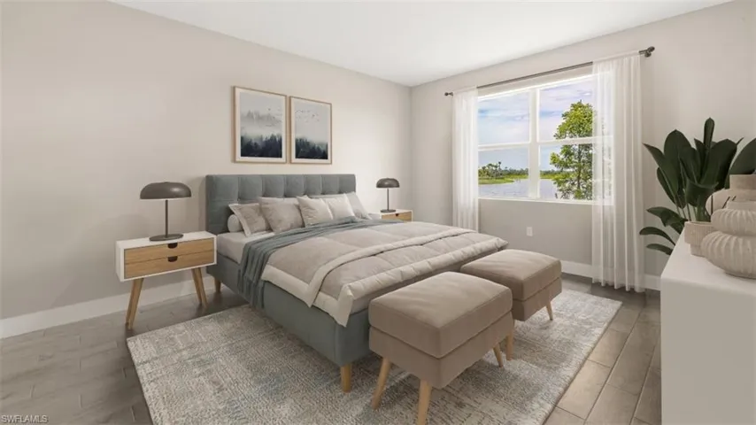 Expansive window, wood-finish flooring, and light wall finishes