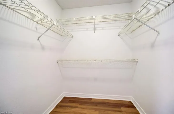 This spacious closet is in the master bedroom.  There is also another reach-in closet opposite this one.