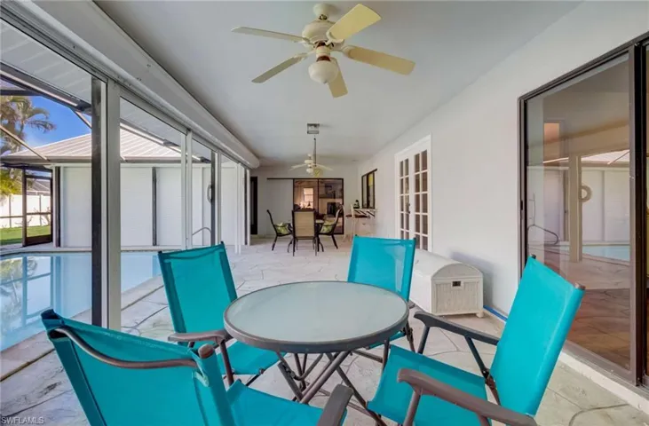 Sitting area right outside the master bedroom is at the opposite end of the sliders to the family room