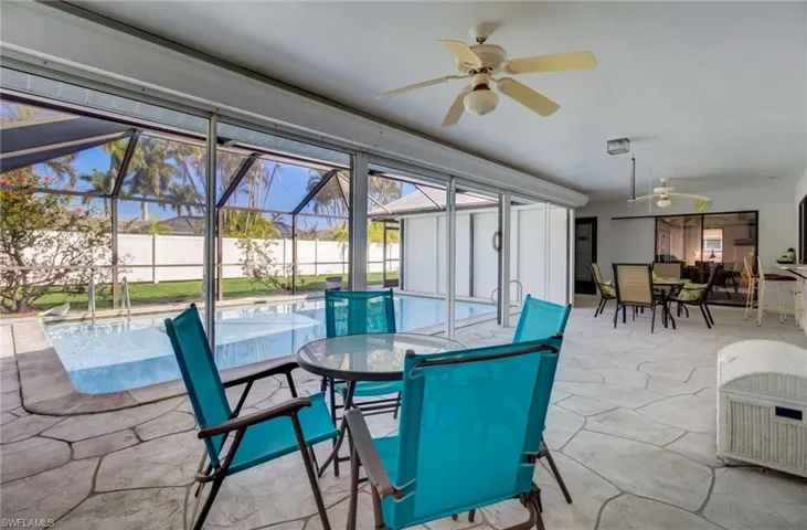 This sitting area outside the master bedroom also over looks the large pool