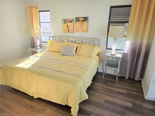 Master Bedroom with hardwood / wood-style flooring