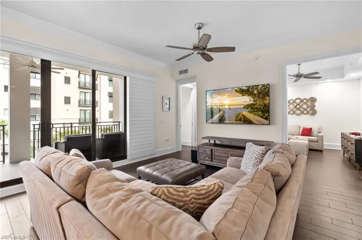 Living area featuring a ceiling fan