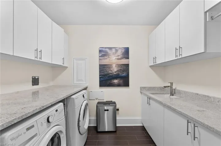 Laundry room, washing machine and dryer, and cabinet space