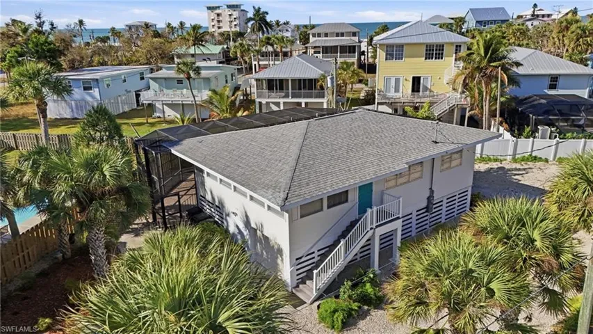 Aerial view of elevated home - Virtually Edited Image