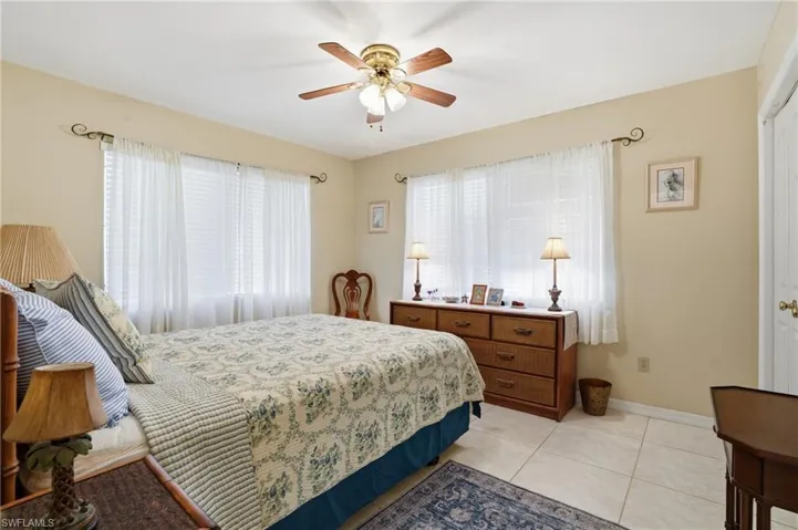 Bedroom with plenty of light filled space - virtually edited image