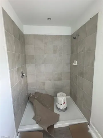 Bathroom with a tile shower