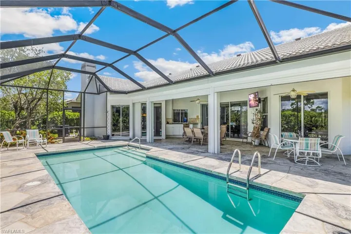 swimming pool with larger undercover shaded area ceiling fans for nice dining area
