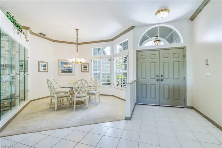 Tiled foyer entrance and dining