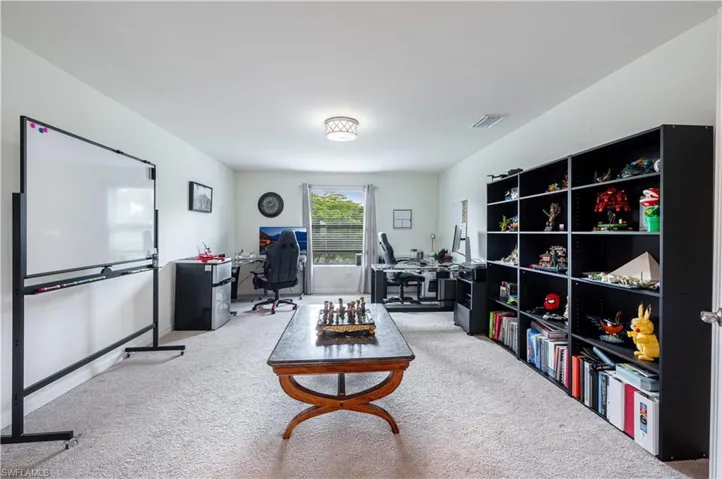 Home office with carpet flooring