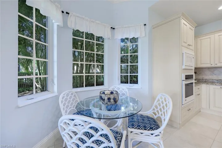 Dining room featuring light tile patterned flooring