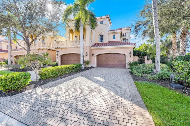 Mediterranean / spanish house with a garage