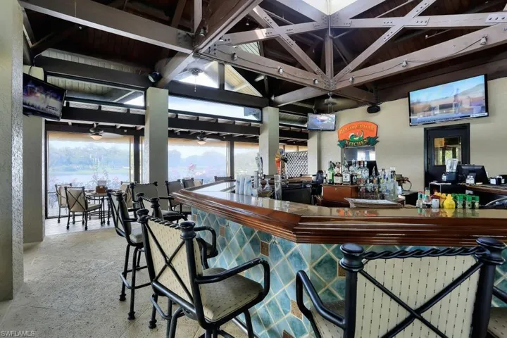 Bar with vaulted ceiling with beams