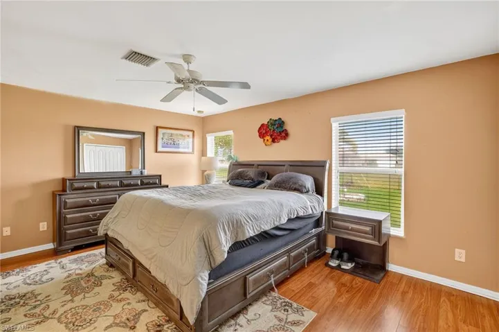 Bedroom featuring light wood-style flooring and ceiling fan