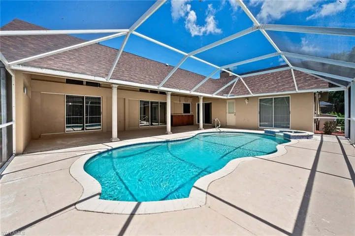 Screened in Lanai enclosure and a patio
