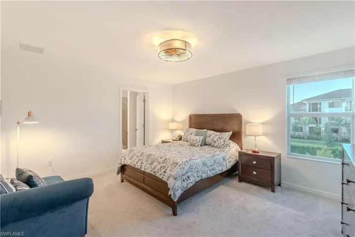 Bedroom featuring carpet flooring