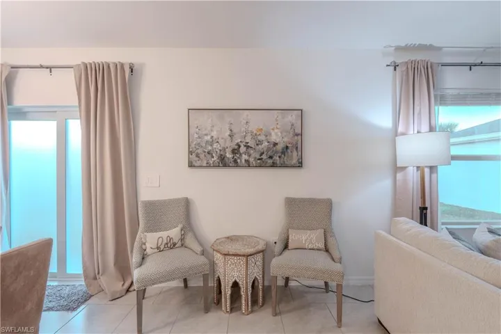 Sitting room featuring tile patterned floors