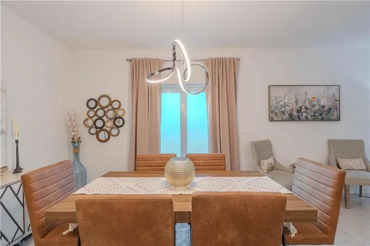 Dining area featuring tile patterned flooring