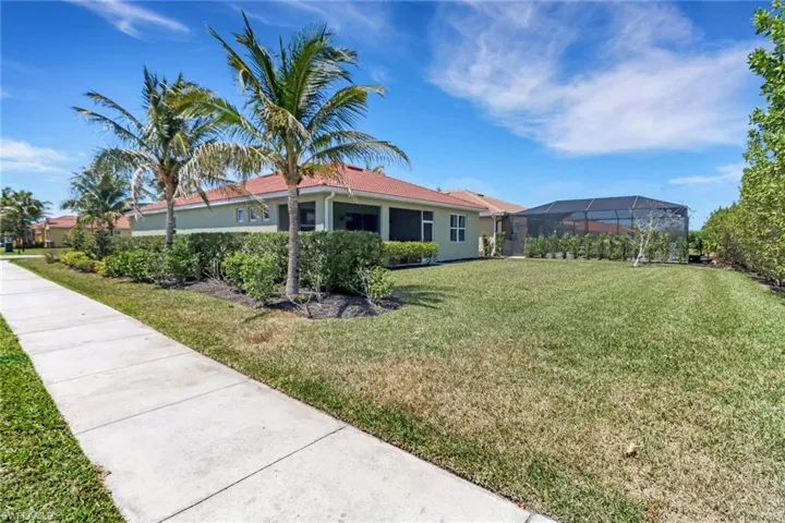 View of yard featuring a lanai