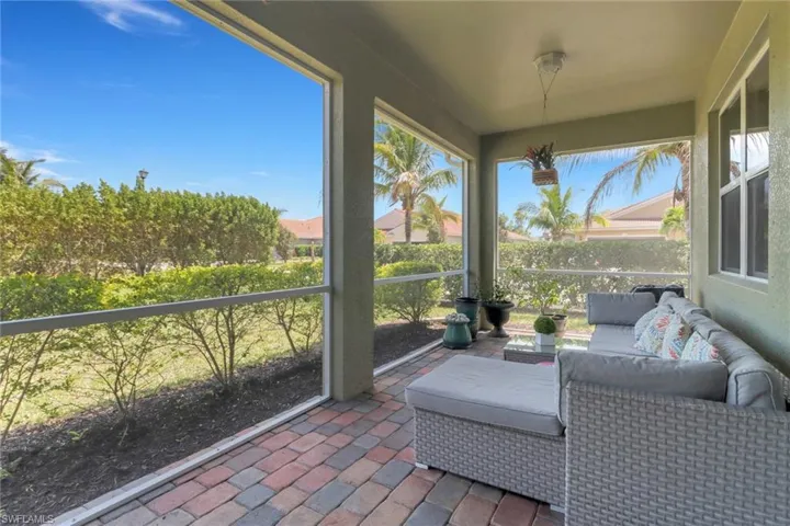 Sunroom / solarium with outdoor lounge area and a wealth of natural light