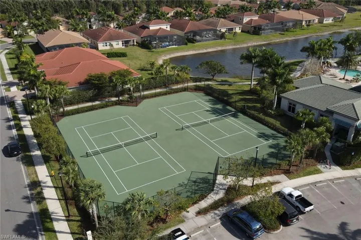 Aerial view featuring a residential view and a water view