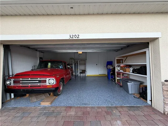 Good size garage with Epoxy flooring