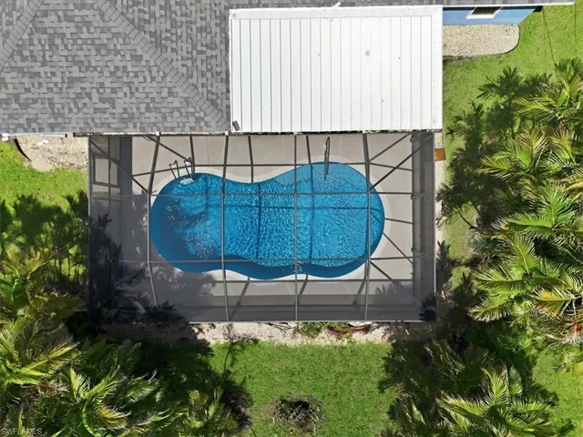 Screened-in pool with contoured design