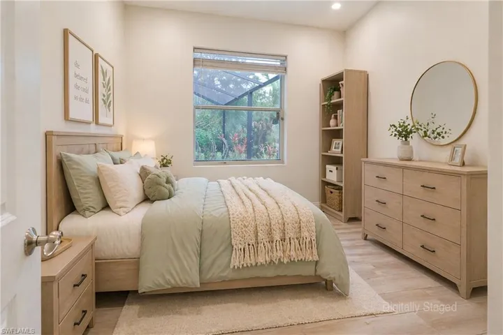 Virtually Staged - Bedroom with a window featuring blinds, recessed lighting, and wood-finish flooring