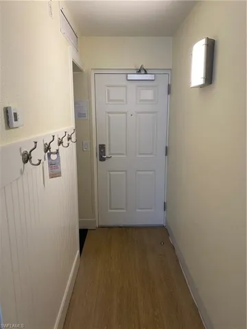 Entryway featuring dark hardwood / wood-style flooring