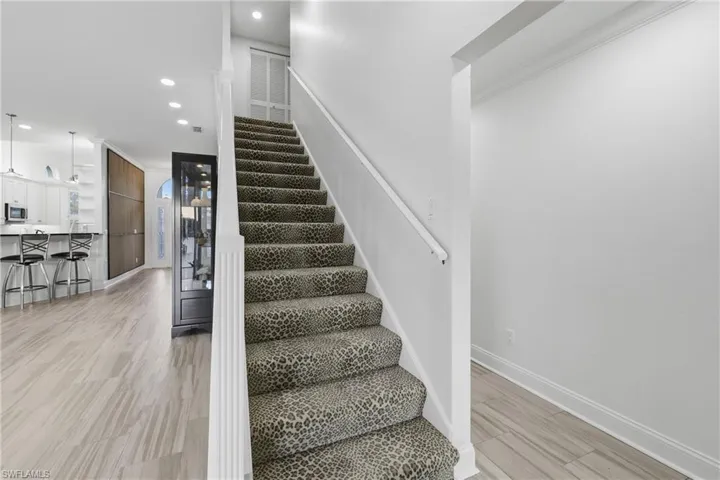 Stairwell to 2nd Master Suite & Full Bathroom