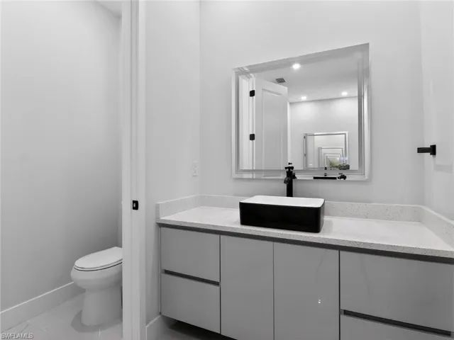 Bathroom featuring toilet and vanity