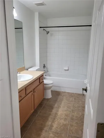 Full bathroom featuring vanity and shower / bathtub combination