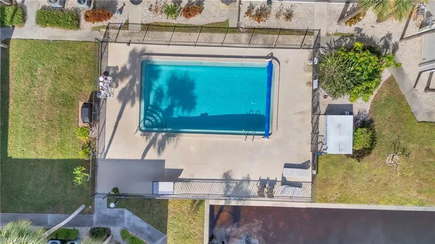 Unit is steps from the pool.