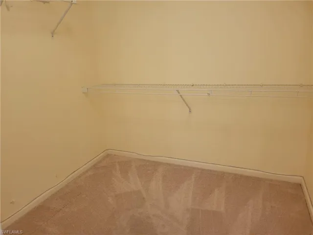 Walk-in closet off master bedroom