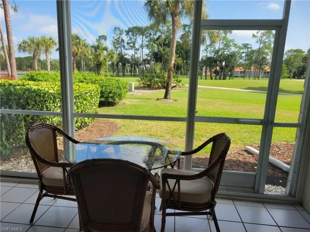 Lanai with impact glass sliders on back wall