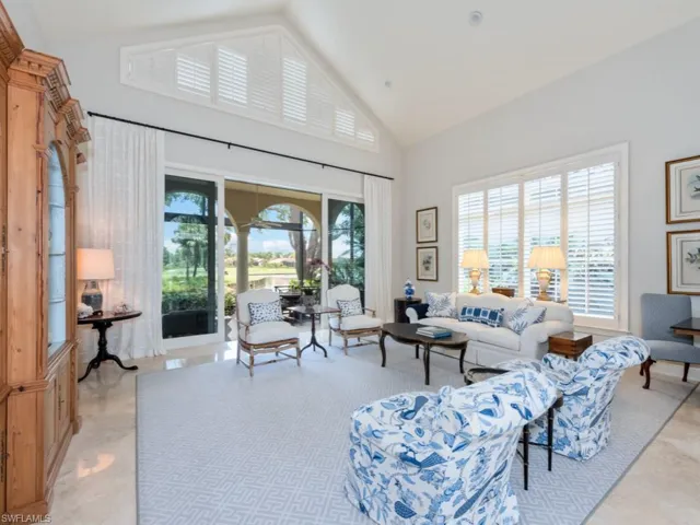 Living room opens to screened lanai