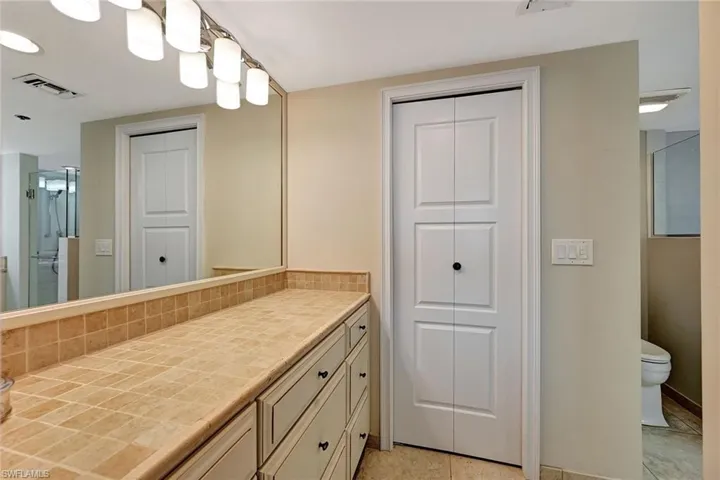 Dressing area between Primary Bed and Bathroom