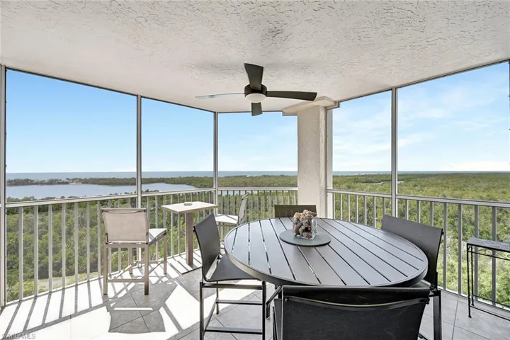 Screened balcony off of Living Area & Primary Bedroom