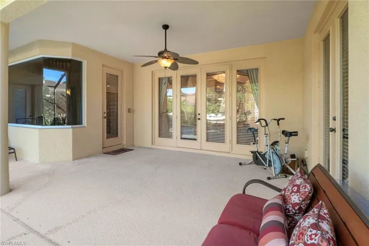 View of patio featuring a ceiling fan and french doors